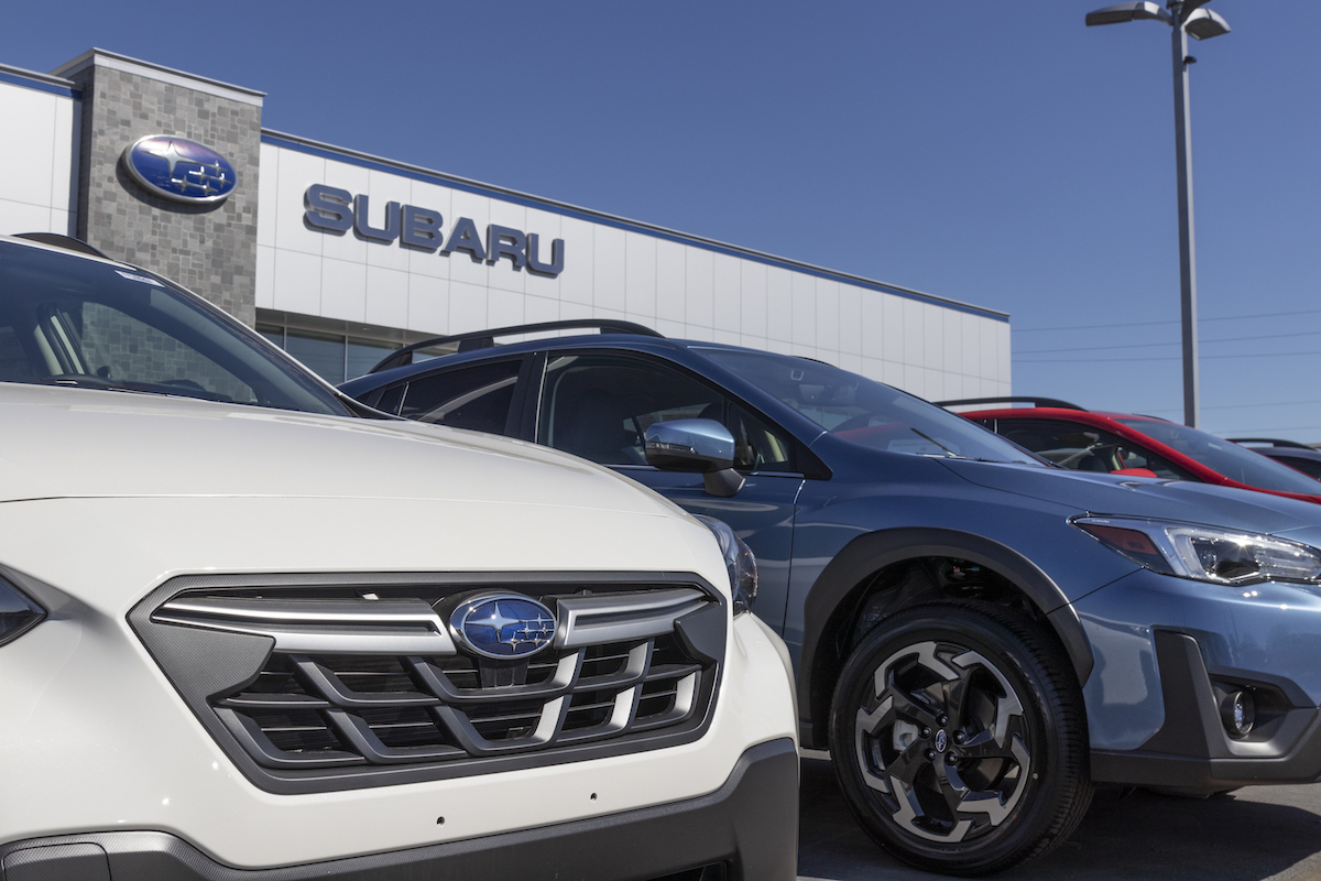 cars parked outside a Subaru dealership