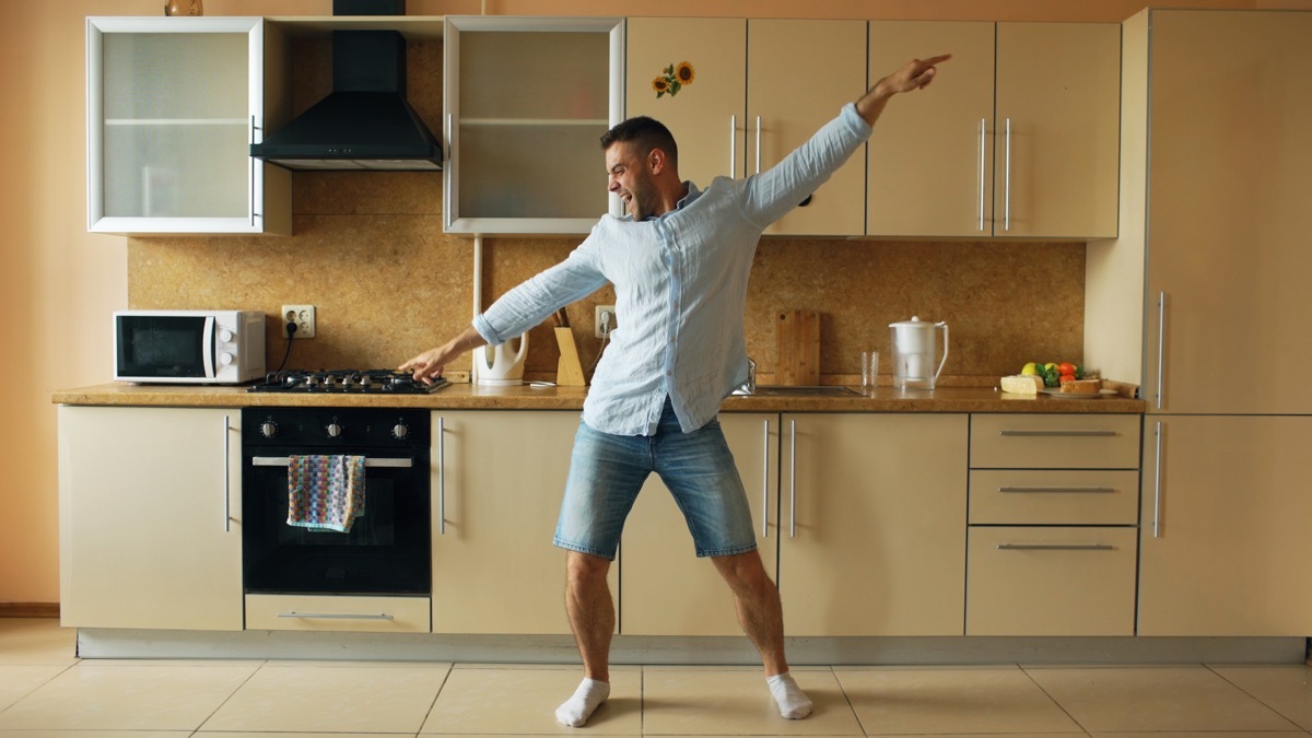 man dancing in kitchen