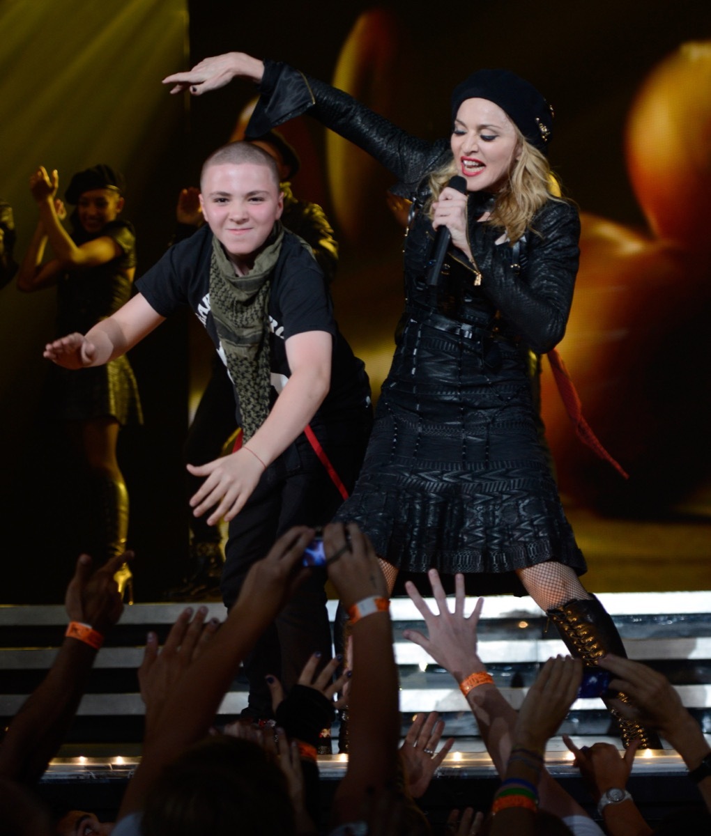 Madonna and Rocco Ritchie performing MDNA tour