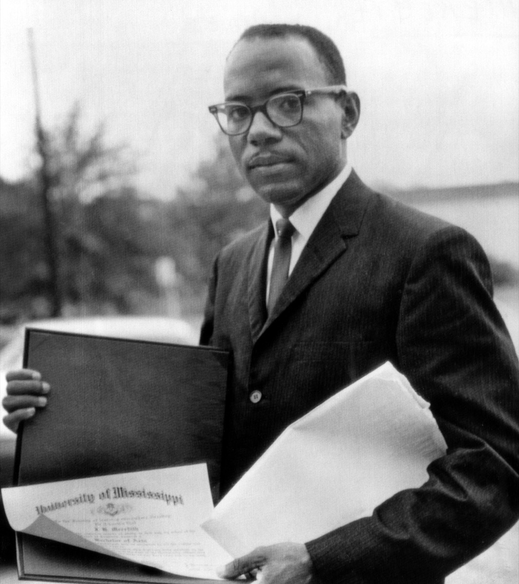 James Meredith, first African American to ever enroll and graduate from the University of Mississippi displays his diploma