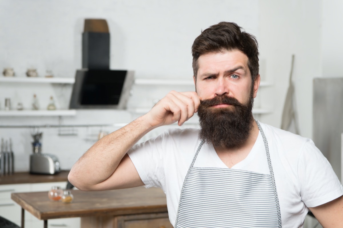 Bearded man in kitchen