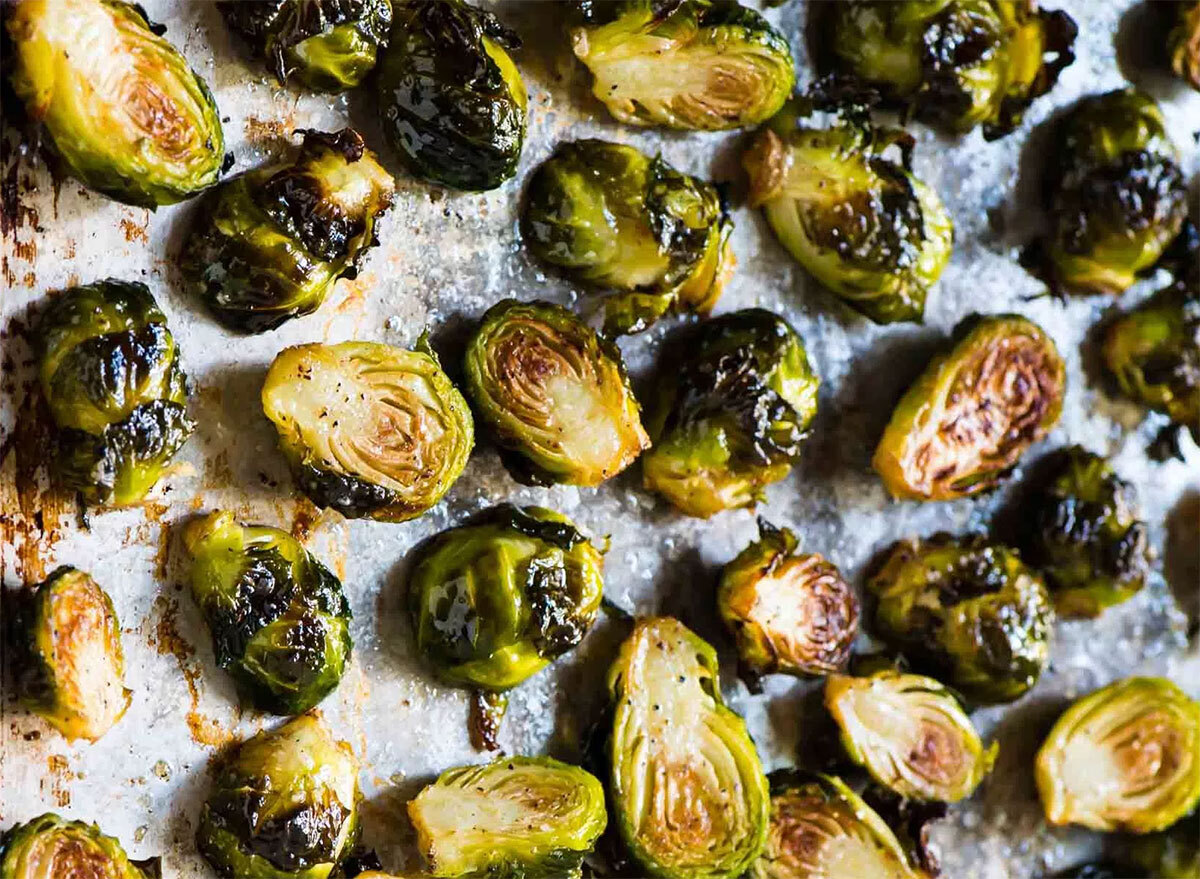 halved roasted brussels sprouts on baking sheet