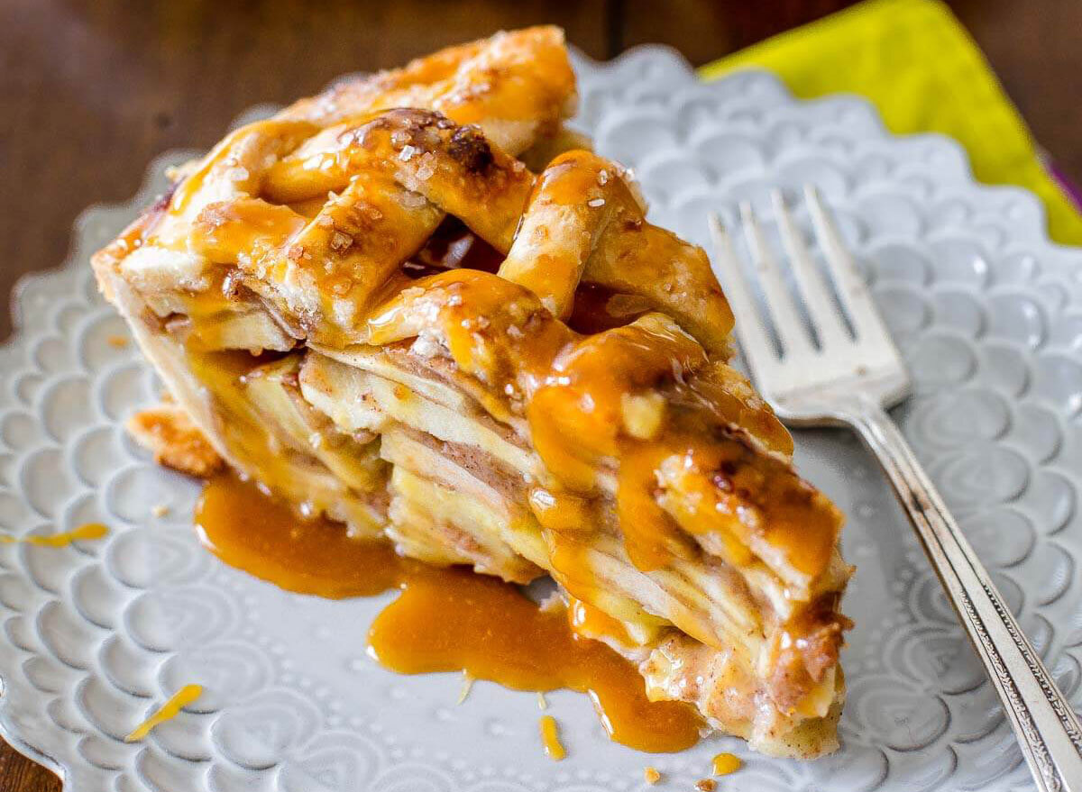 salted caramel apple pie slice on plate with fork