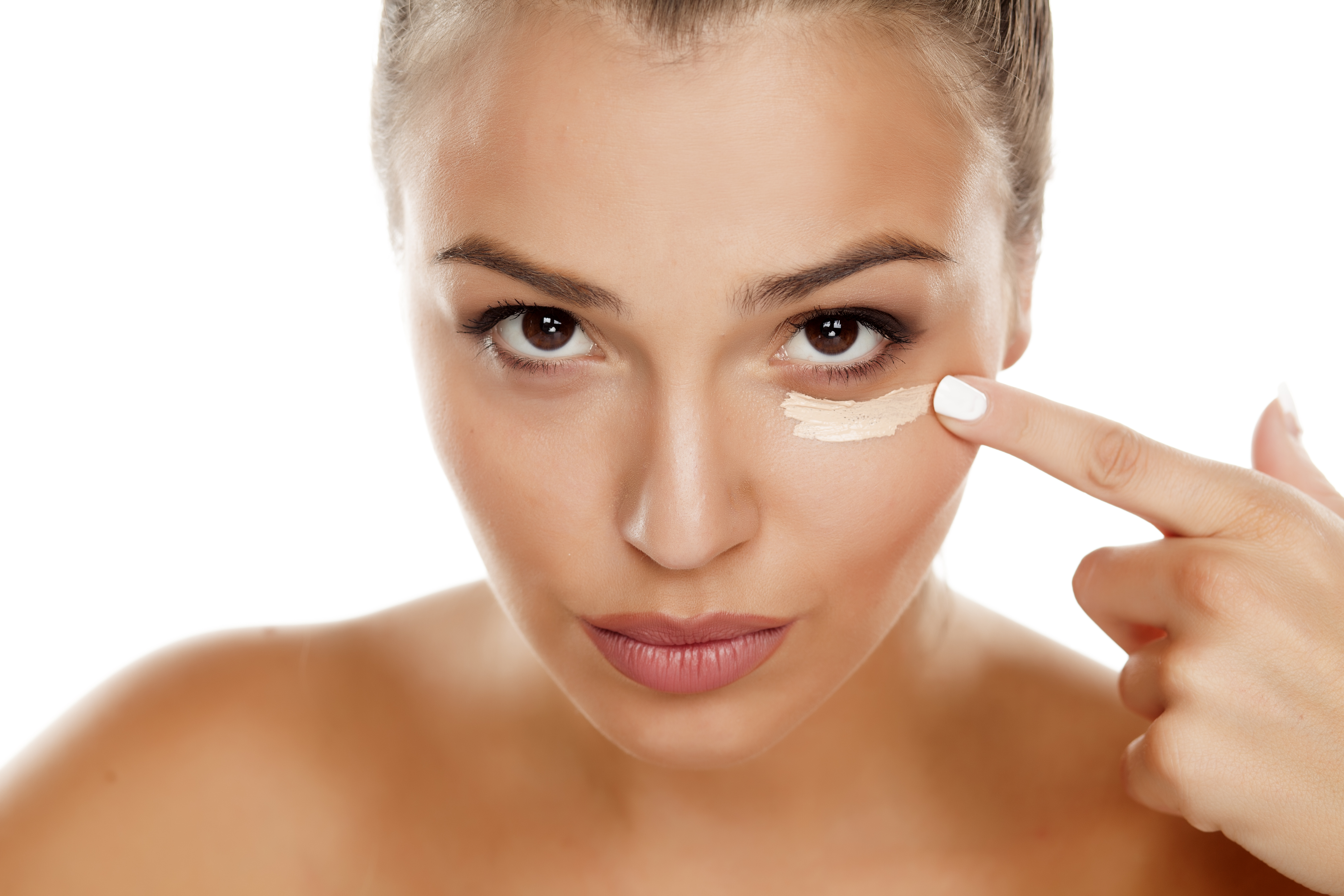 woman applying eye cream, healthy skin after 40 