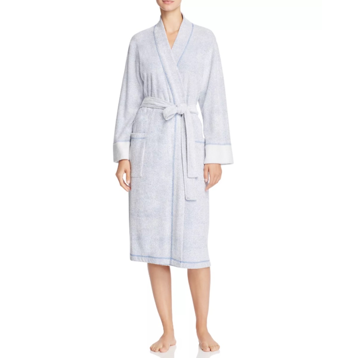 white woman in light blue bathrobe