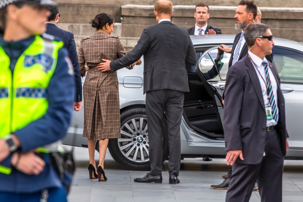 prince harry helping meghan into a car, prince harry father