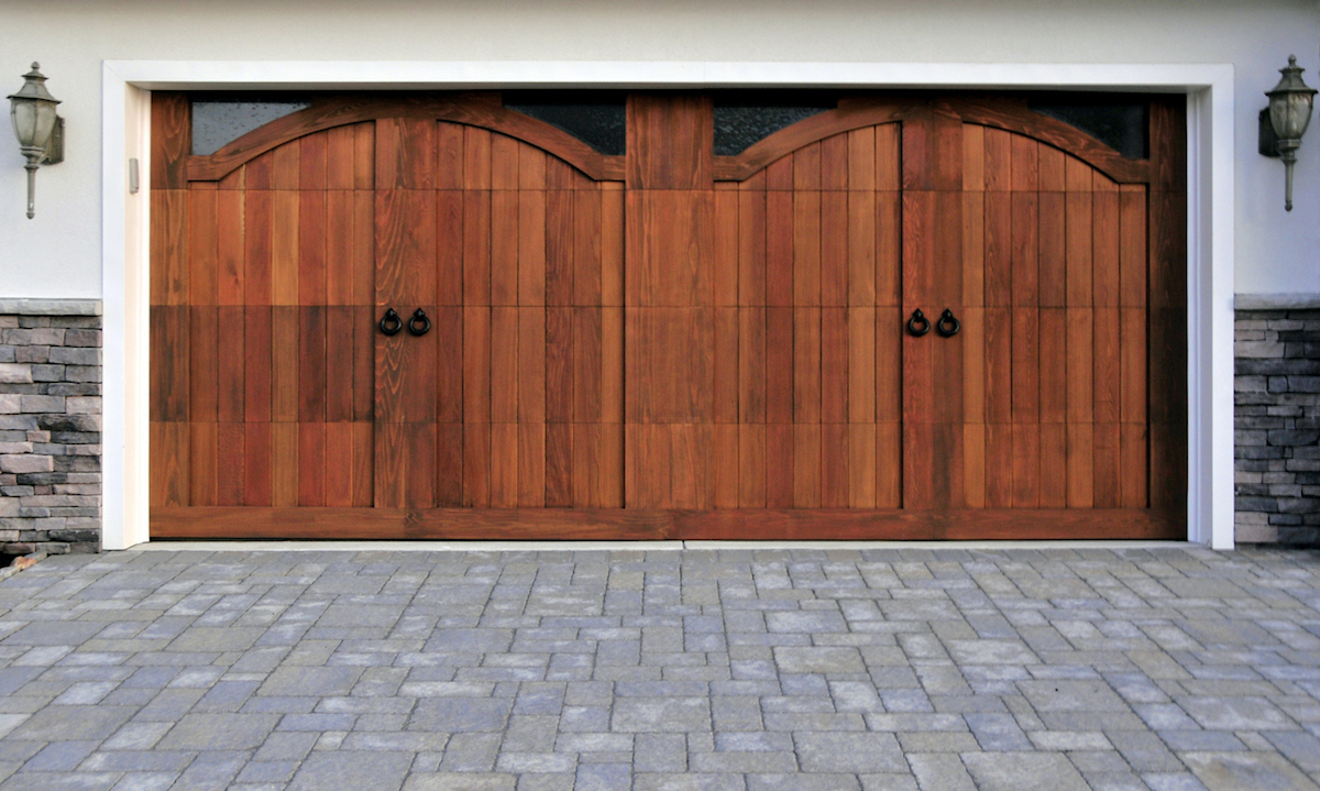 Gorgeous wooden garage doors with custom paved driveway. See my many other masonry pictures (clickHERE)