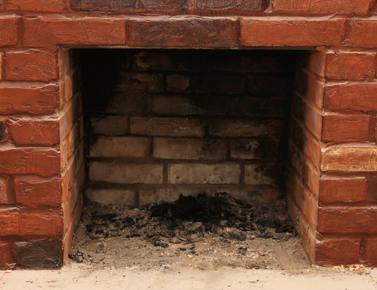 dirty brick fireplace