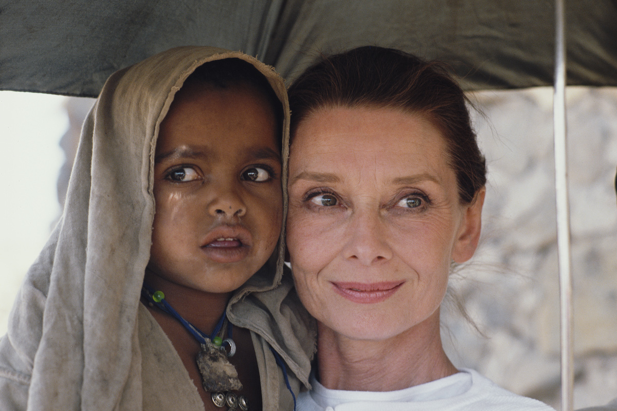 Actor and humanitarian Audrey Hepburn with an Ethiopian girl on her first field mission for UNICEF in Ethiopia, 16th-17th March 1988.