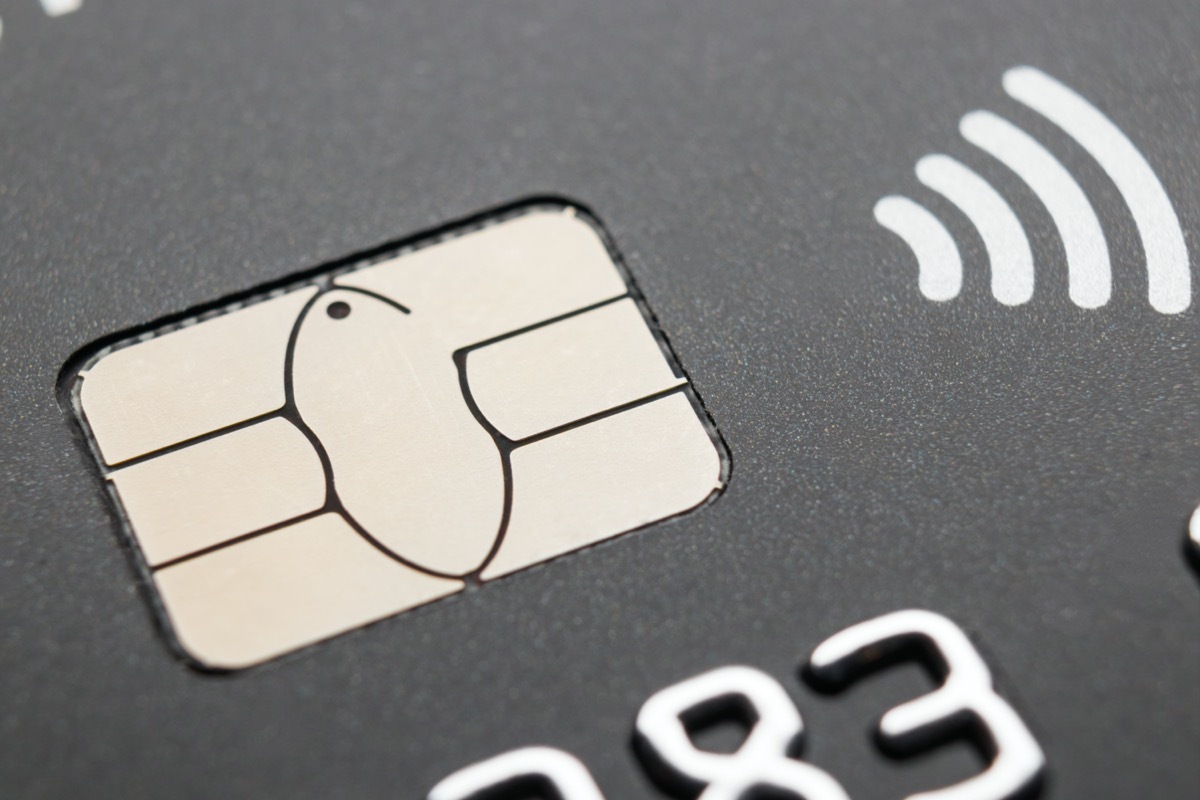 Credit card with contactless payment symbol