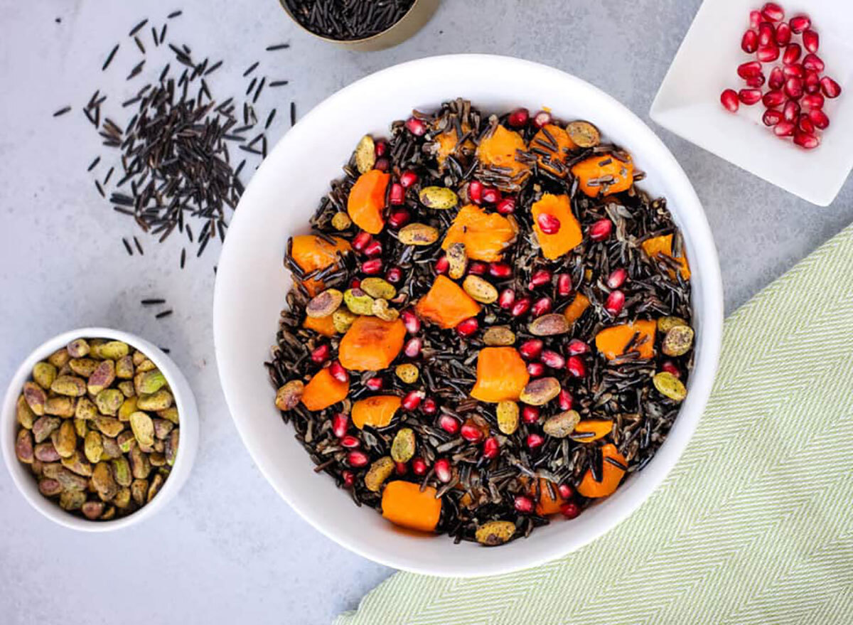 wild rice bowl with pomegranate seeds and cubed butternut squash