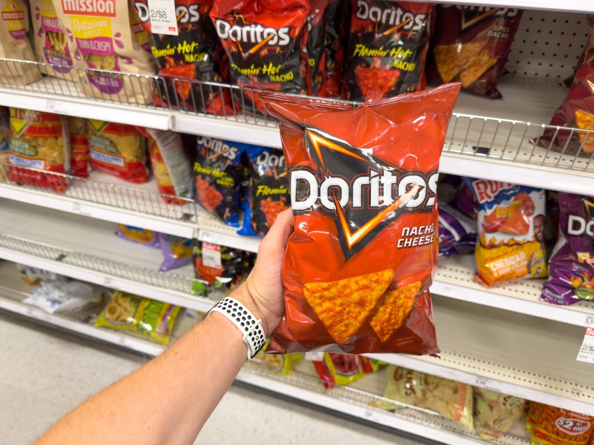 Los Angeles, CA - June 16, 2023: Bag of Doritos Nacho Cheese flavored corn chips inside a grocery store.