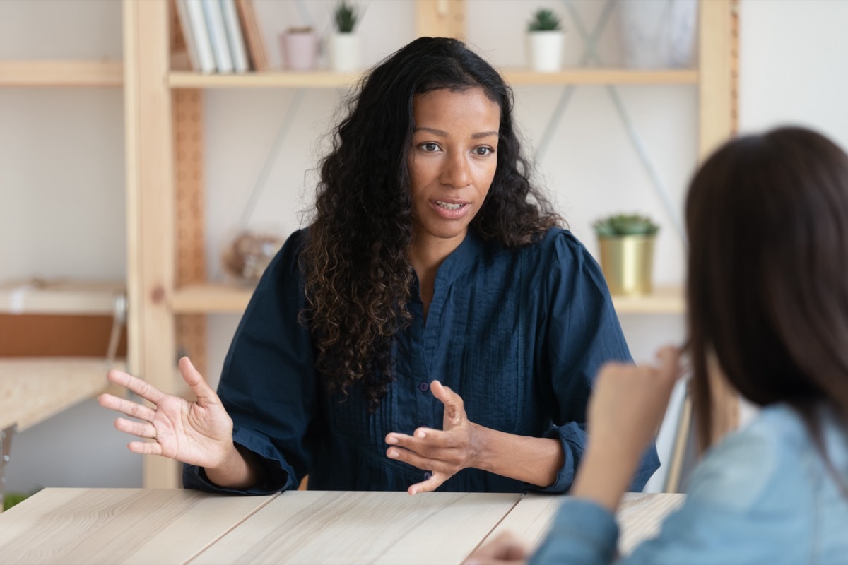 women talking to her boss