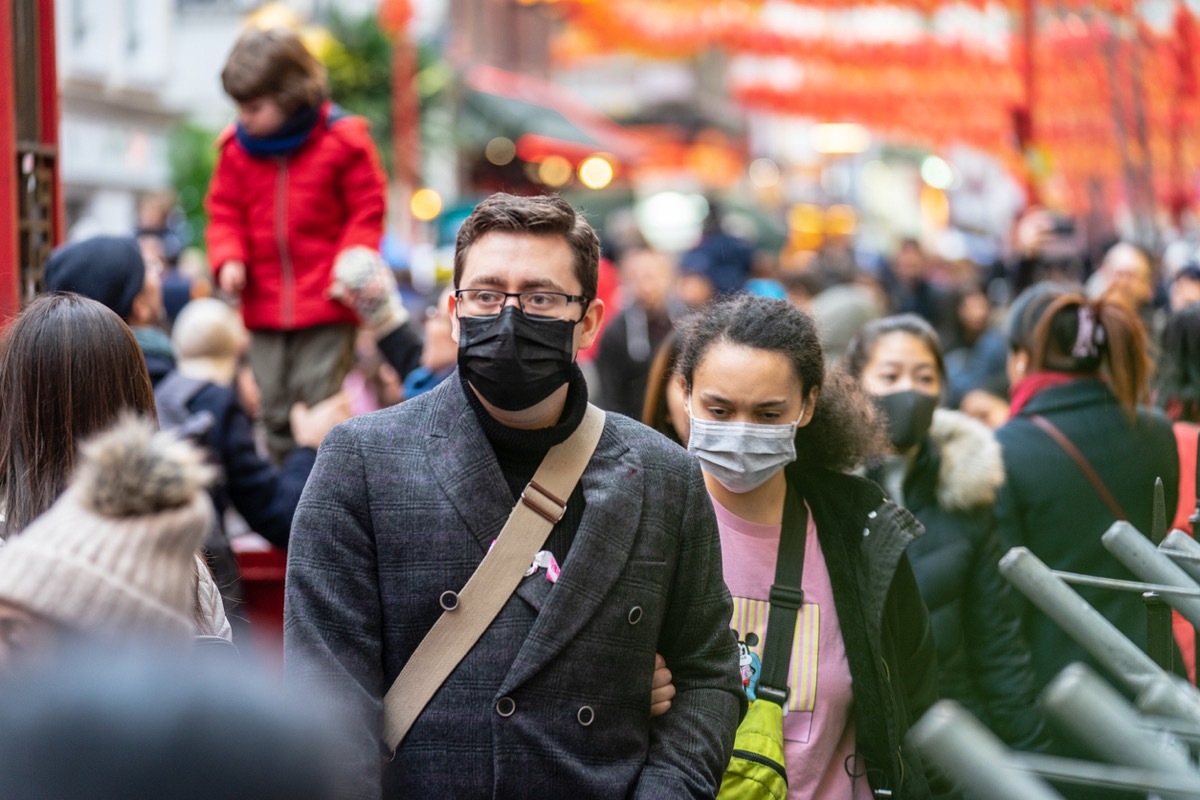 People in London wearing face masks to protect themselves against coronavirus