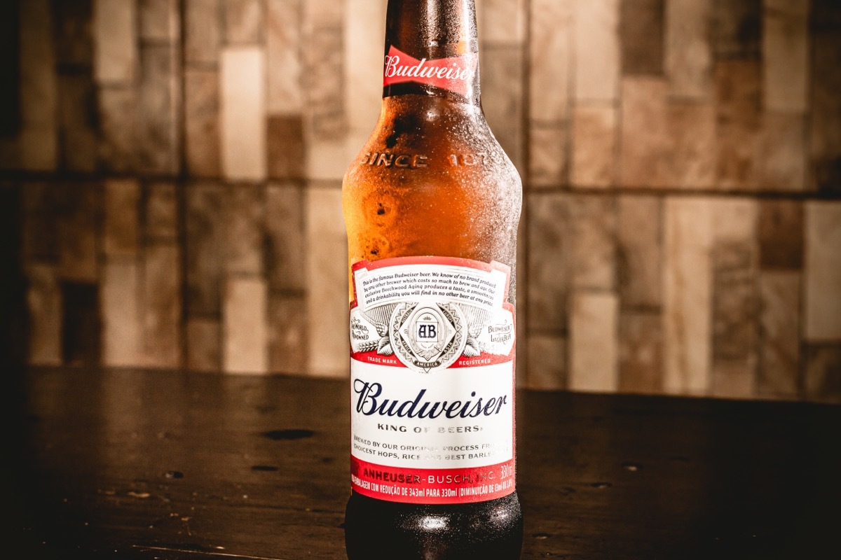 budweiser beer in a bottle on a table