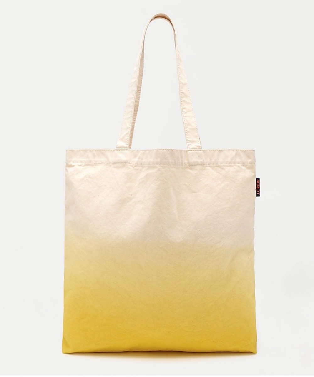 yellow and white tote bag