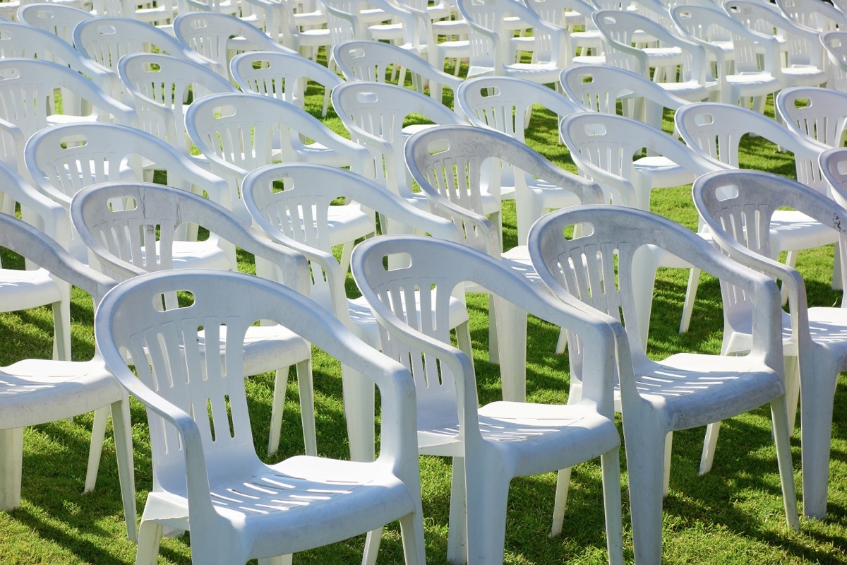 plastic chairs in the field