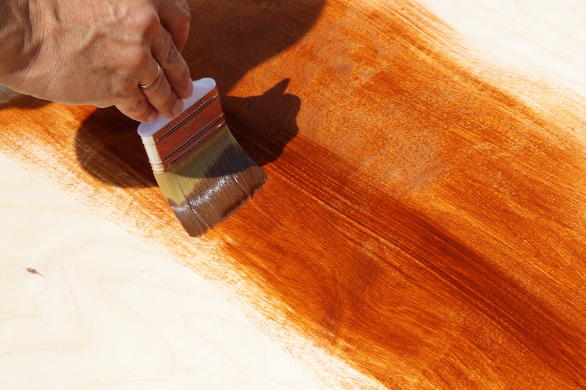 man working on untreated wood things in your house attracting pests