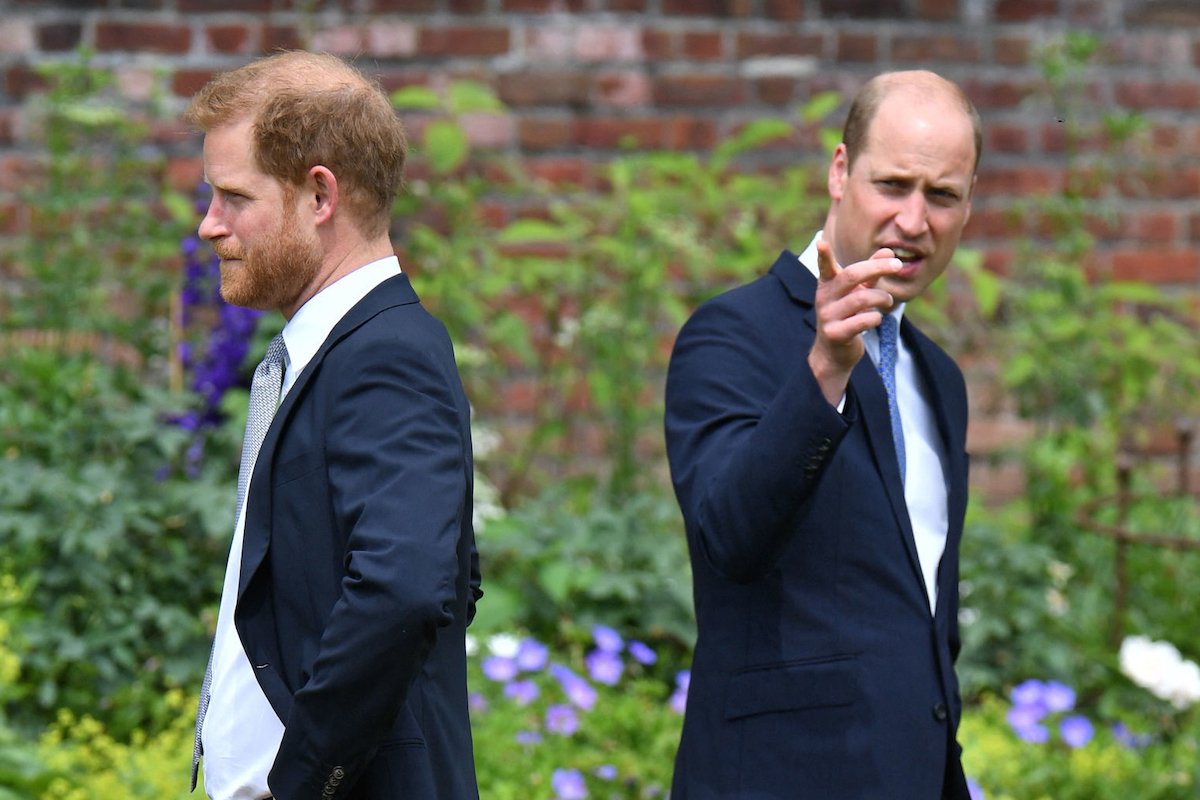 Prince Harry, Duke of Sussex (L) and Britain's Prince William, Duke of Cambridge attend the unveiling of a statue of their mother, Princess Diana at The Sunken Garden in Kensington Palace, London on July 1, 2021, which would have been her 60th birthday