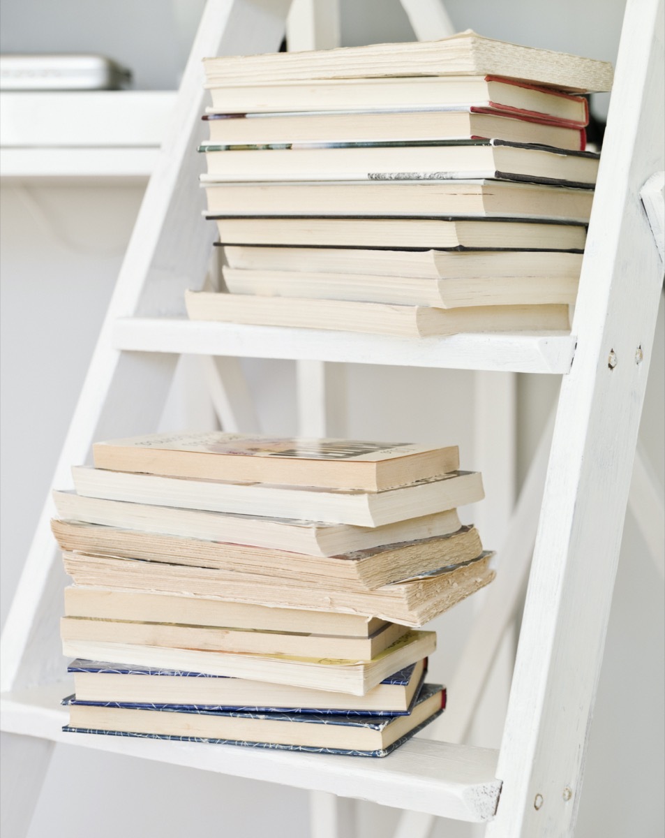 books on white ladder