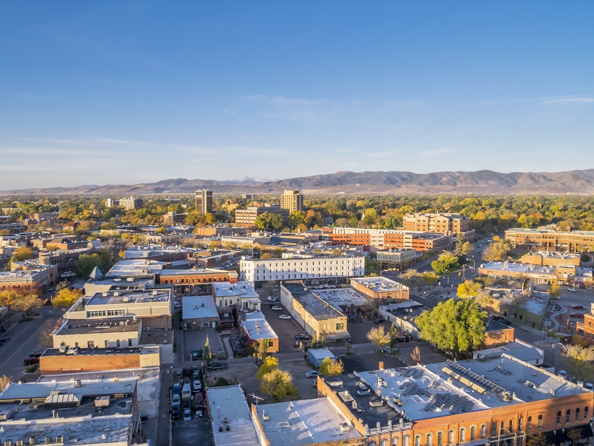 aerial view of Fort Collins downtown in sunrise light, Rocky Mountain foothills in background