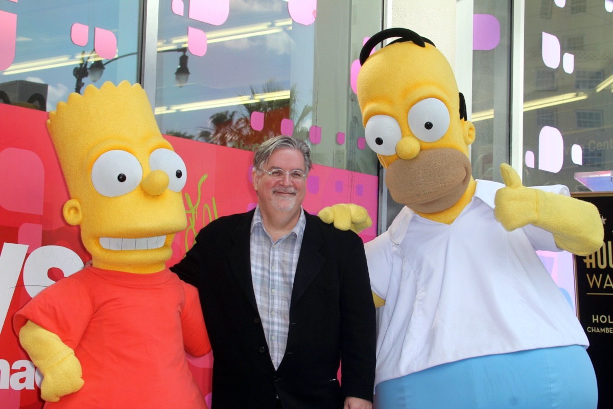 Matt Groening with Homer and Bart Simpson
