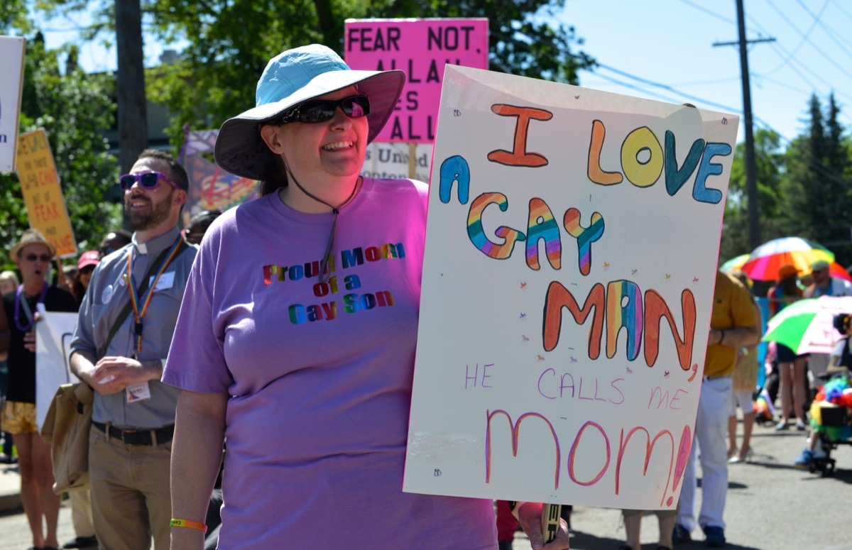 mother shows support of gay son at edmonton pride parade photos from pride celebrations
