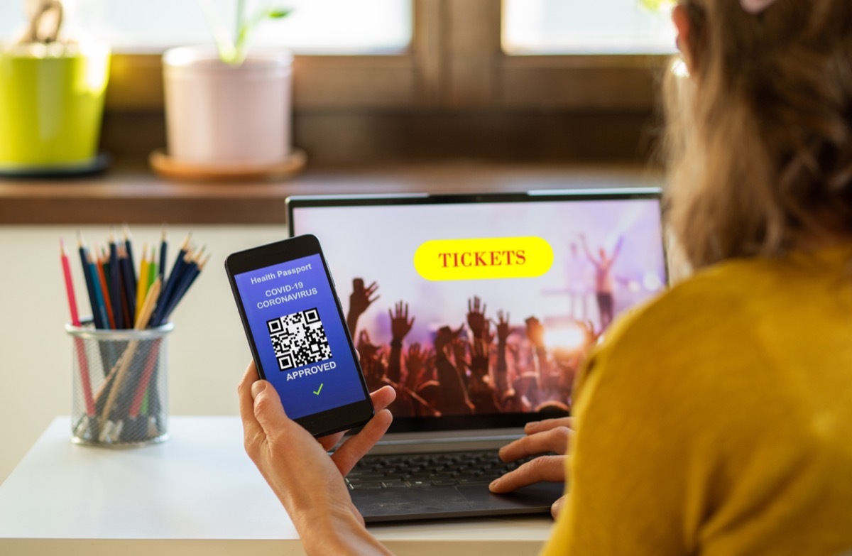 Woman Buying Concert Tickets Online