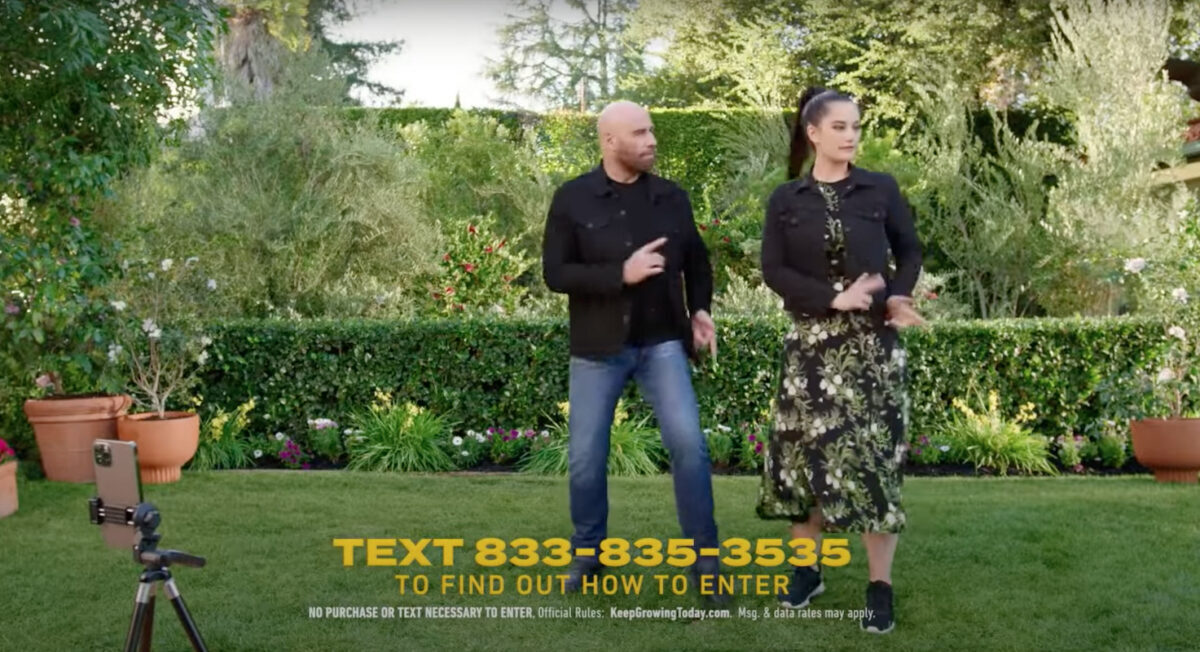 John and Ella Travolta in their Scotts Lawn Super Bowl ad