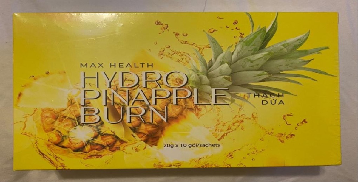 yellow box of max health hydro pineapple supplements with pineapple image on box