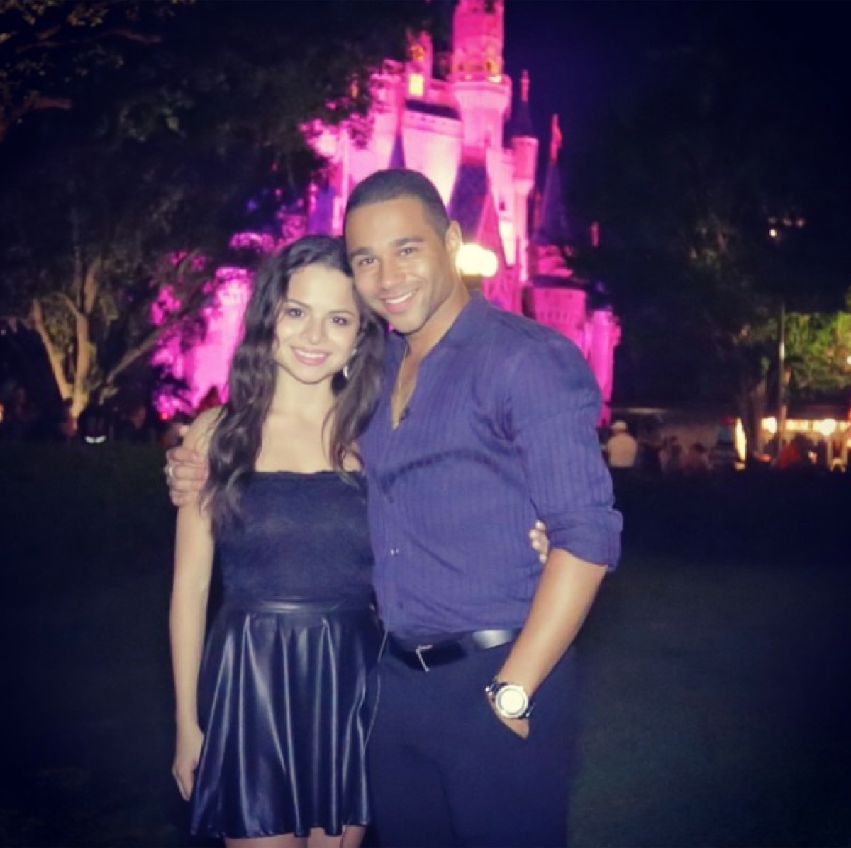 corbin bleu with girlfriend in front of castle at disney world, disney celebs