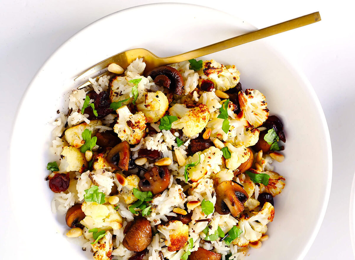 roasted cauliflower with mushrooms and wild rice stuffing