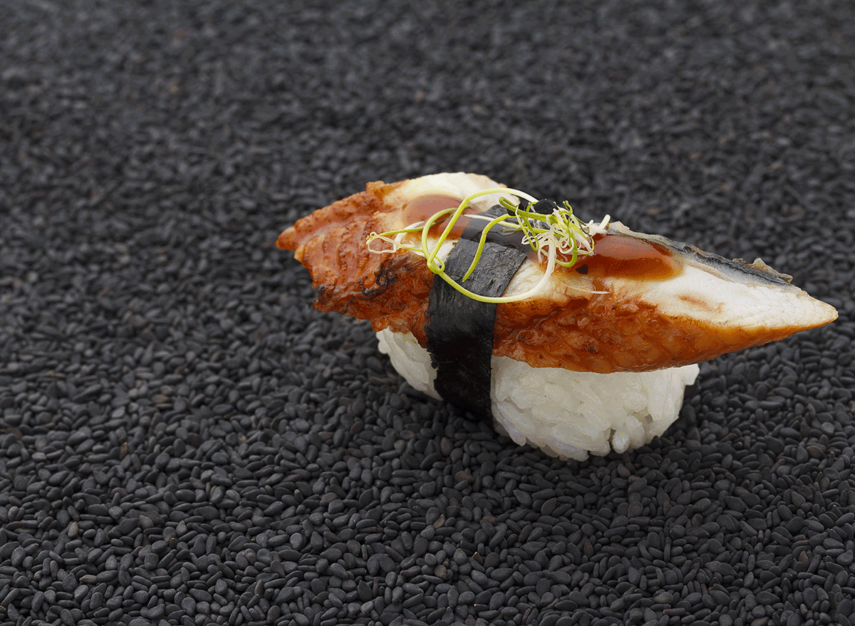 piece of eel on top of sushi rice