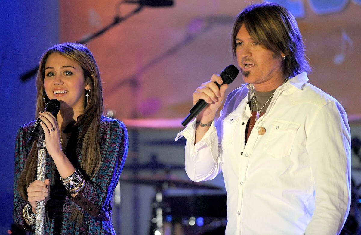 Miley Cyrus and Billy Ray Cyrus on stage for ABC Good Morning America Concert in 2009