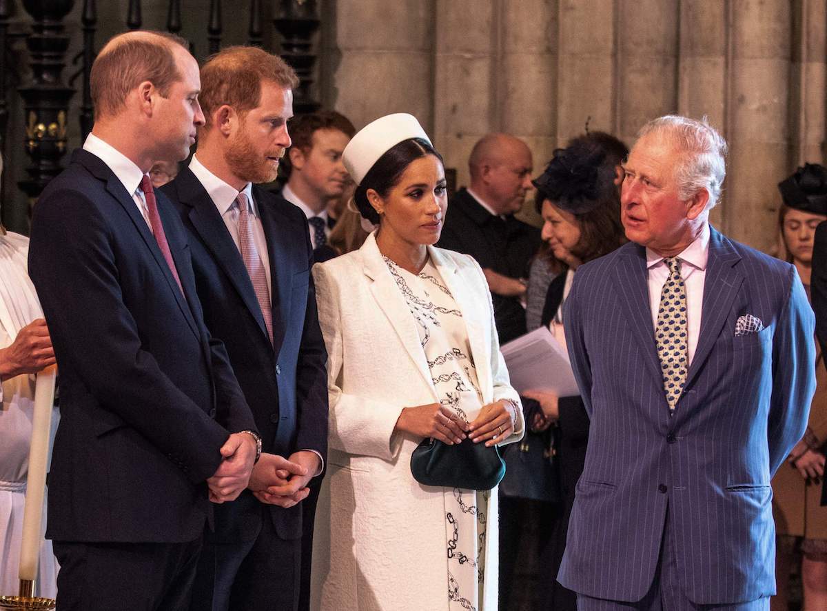 Meghan, Duchess of Sussex talks with Prince Charles, Prince of Wales, as Prince William, Duke of Cambridge, talks with Prince Harry, Duke of Sussex, as they all attend the Commonwealth Day service at Westminster Abbey in London on March 11, 2019. 