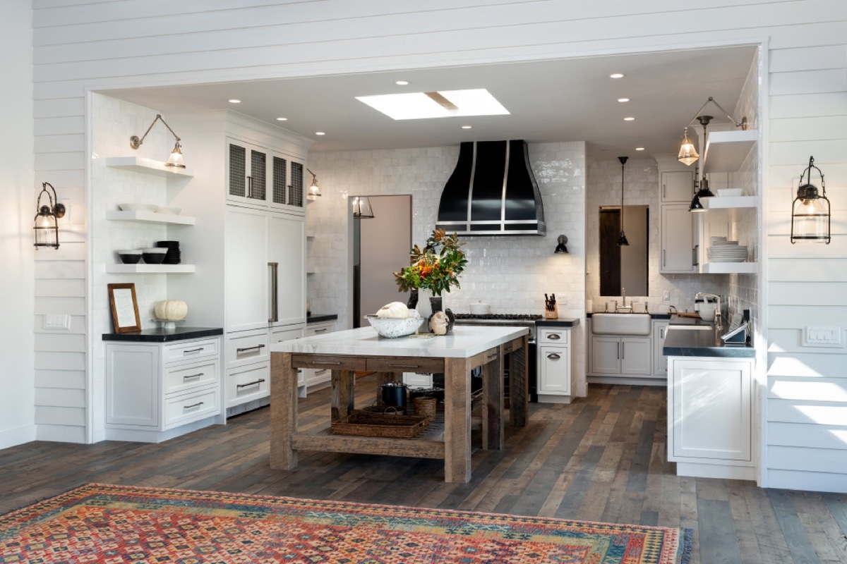 farmhouse kitchen with persian rug, joanna gaines tips