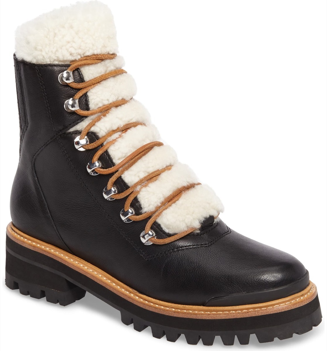 black lace up boots with white shearling tongue