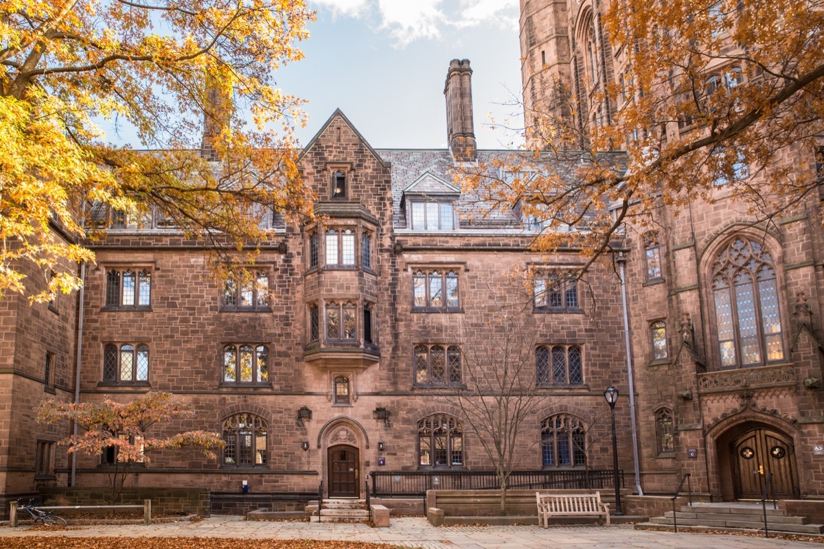 Pictured here is a view of Bingham Hall on the old campus of Yale University on an autumn day. Yale is a prestigious Ivy League university dating back to the 1700's.