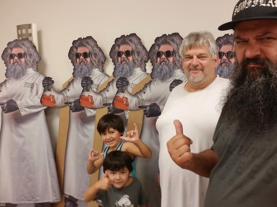 travis with long beard and sons