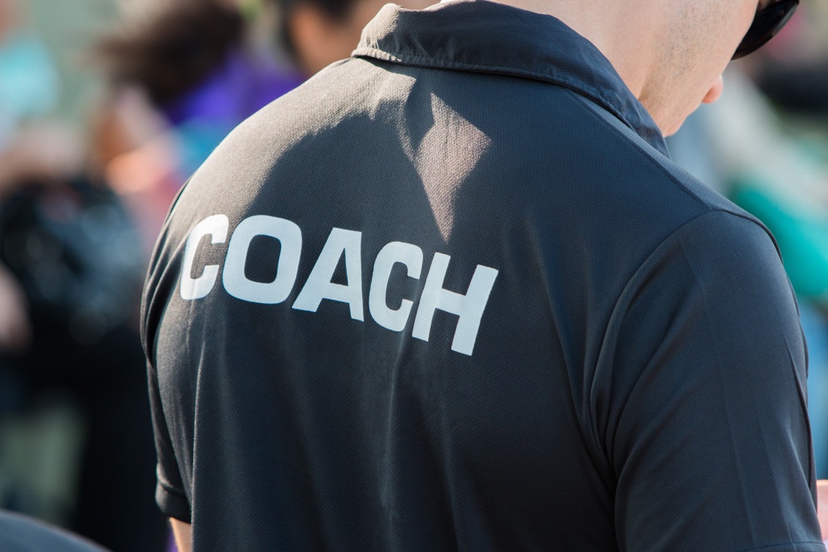 back of coach's black shirt
