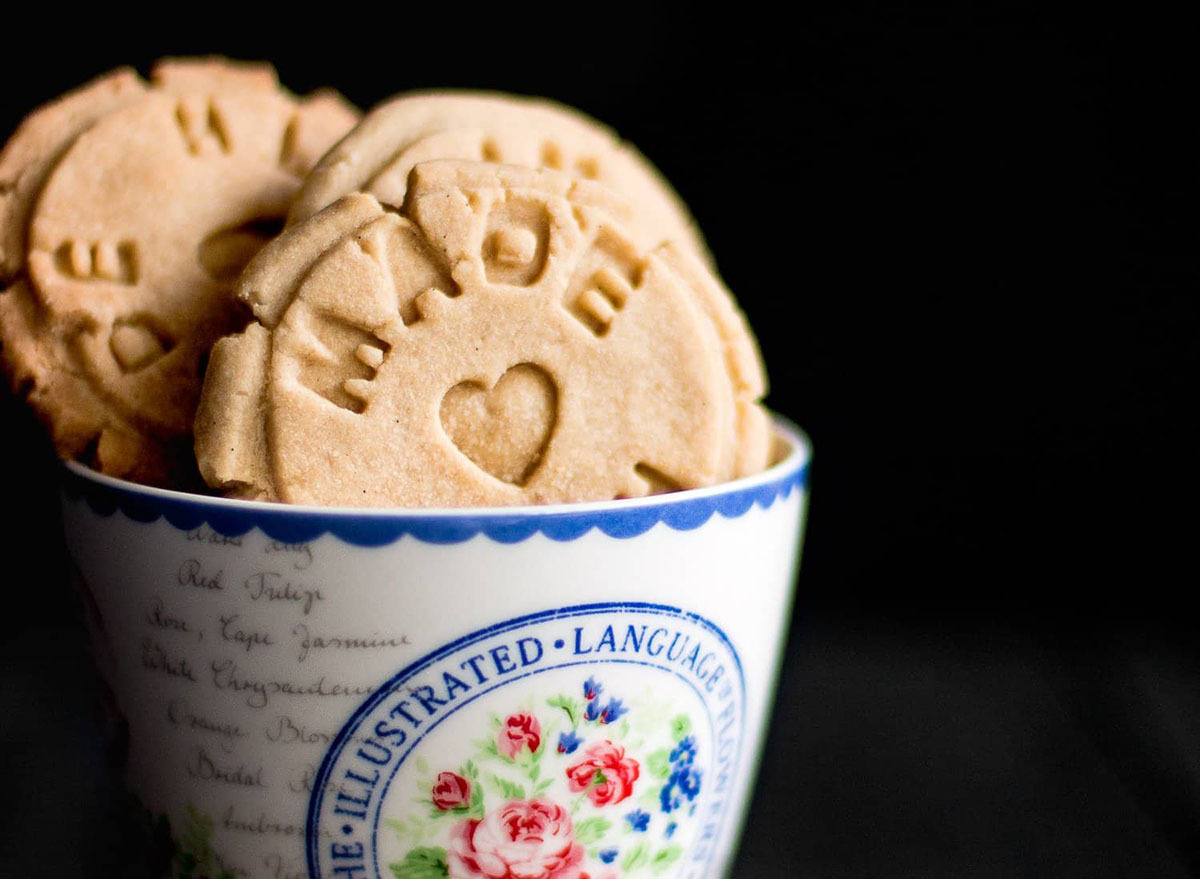 Shortbread cookies in a mug with a dark background