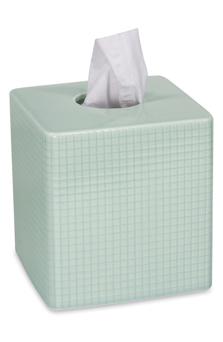 green tissue box, bathroom accessories