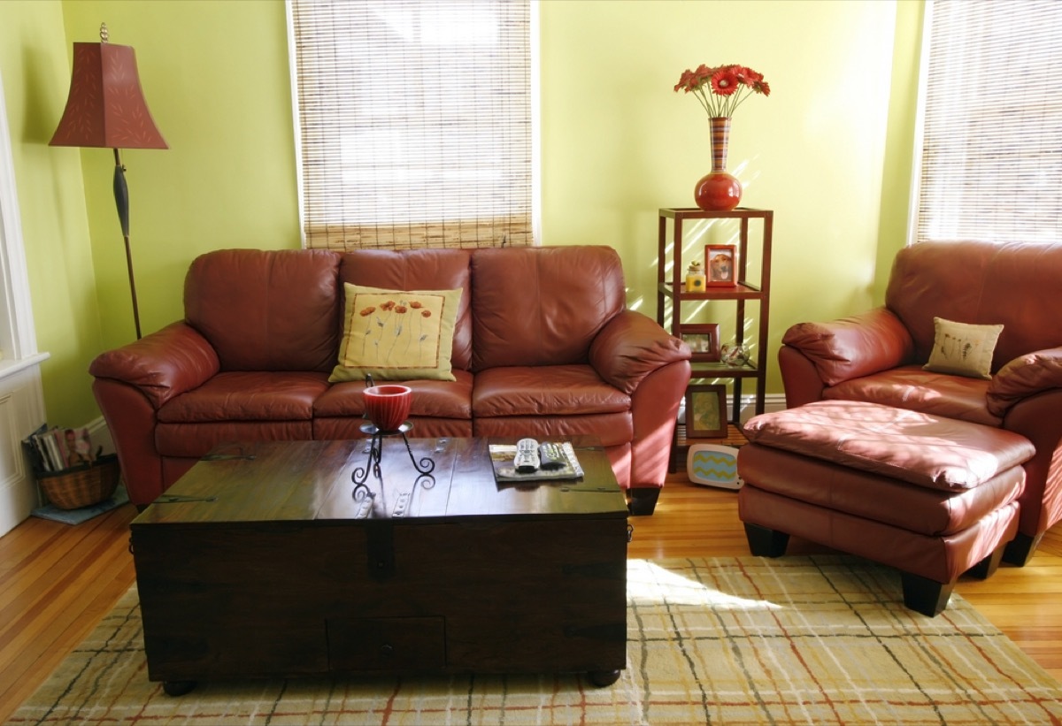 leather couch and chair in living room, interior design mistakes