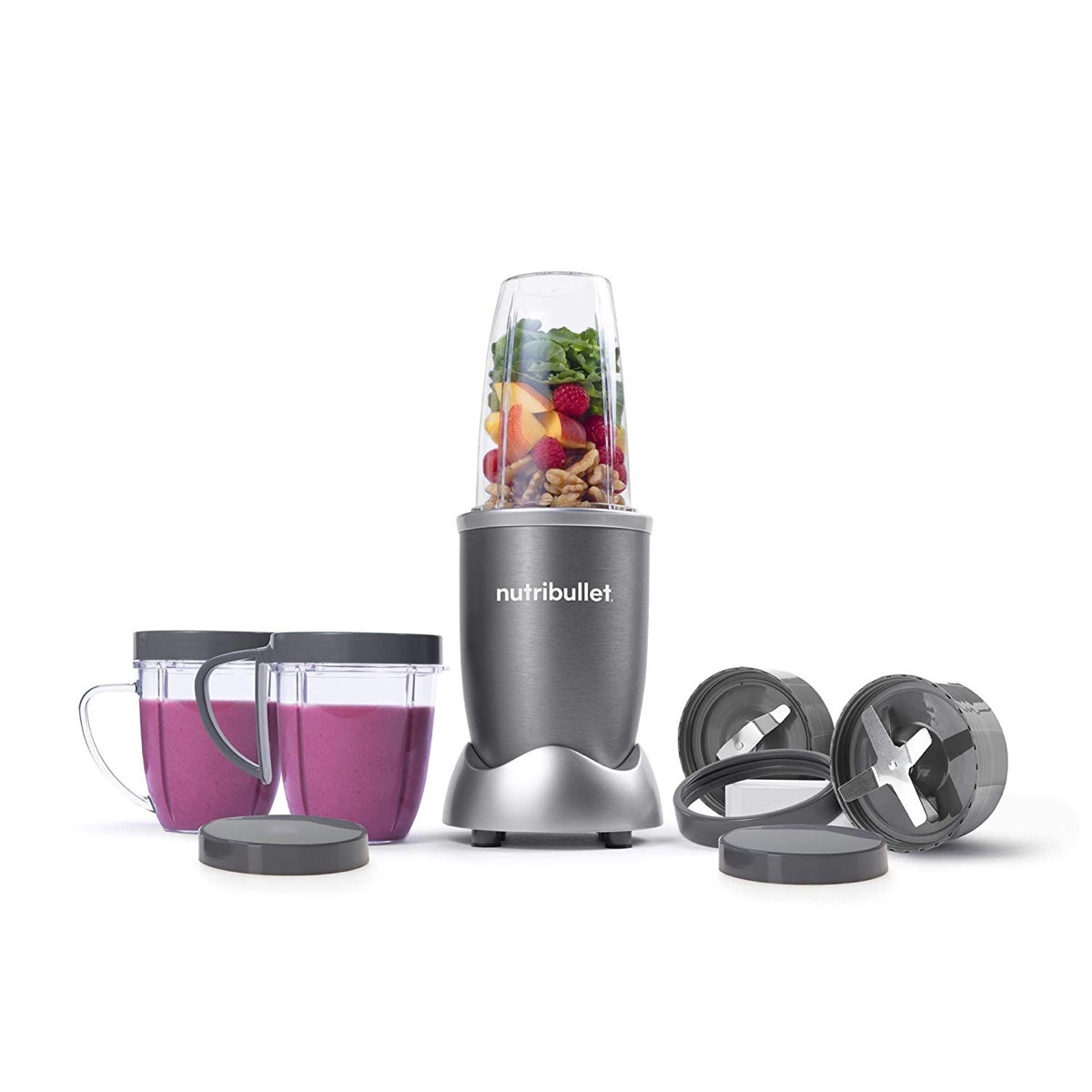 nutribullet blender with two cups, two blades, and additional lids