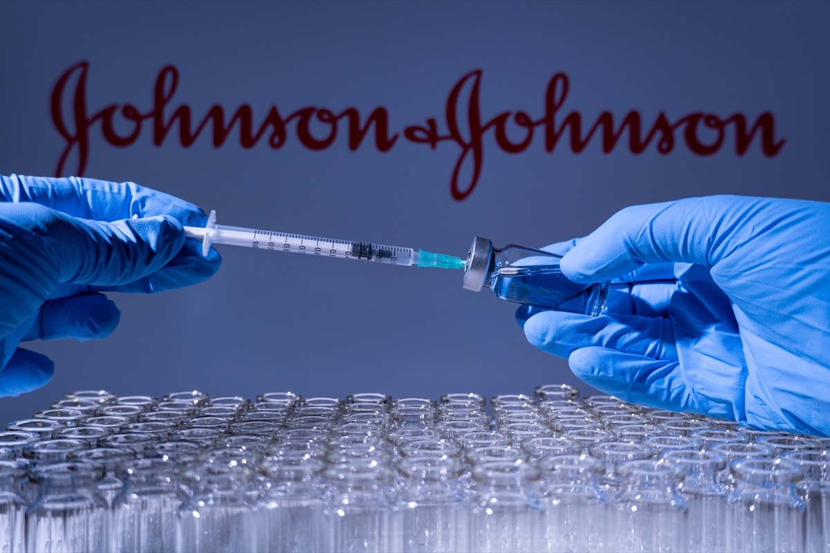 johnson & johnson vaccine logo, hands, blue gloves