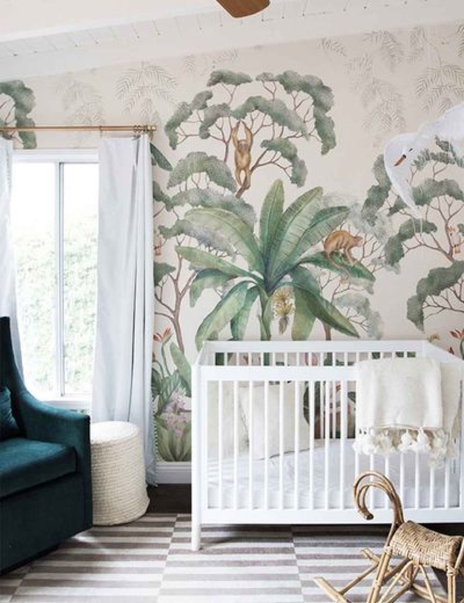 Nursery with jungle wallpaper 