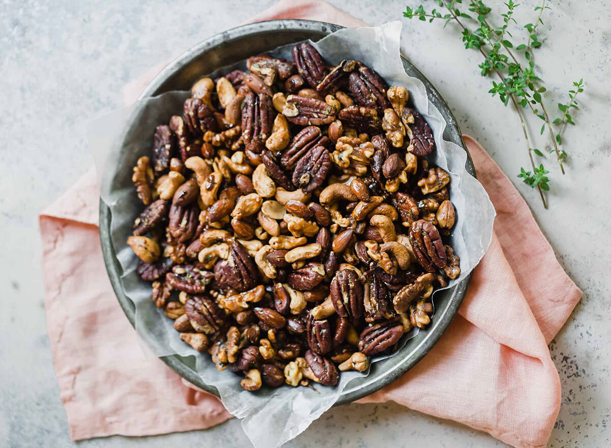 bowl of spiced nuts with cashews pecans and walnuts