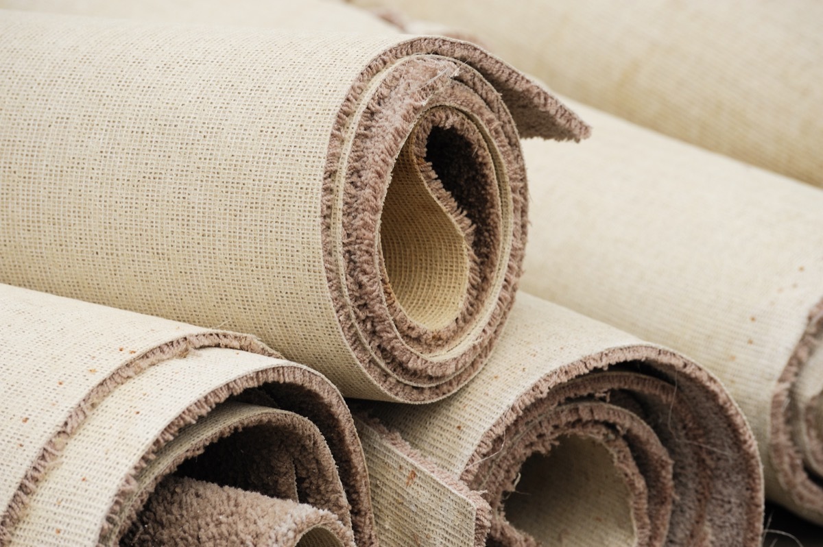 Some rolled-up carpets