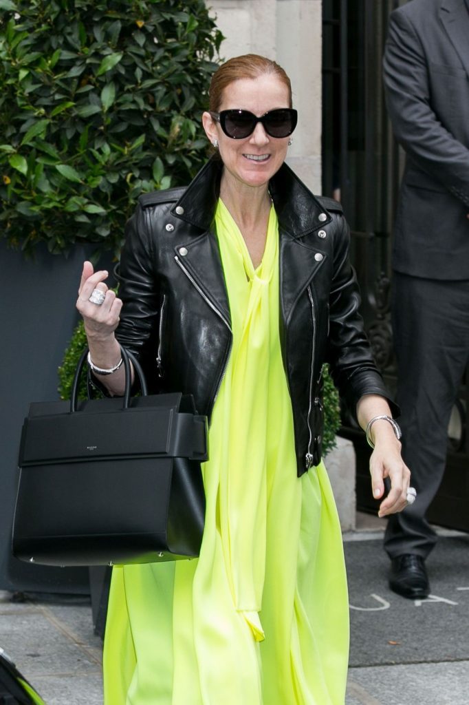 leather boots with a leather jacket and neon yellow tunic Celine Dion #2 | 10 Reasons Why Celine Dion Is Our New Style Icon | Her Beauty