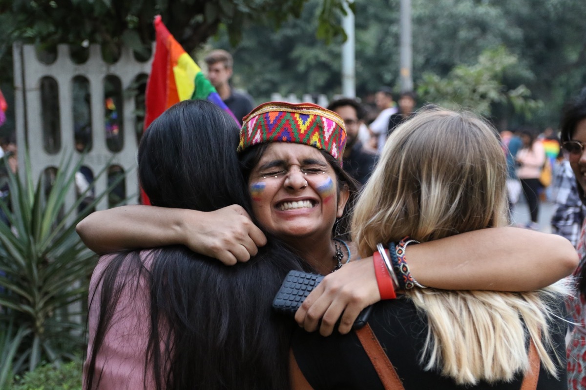 people hugging at delhi queer pride parade in india photos from pride celebrations